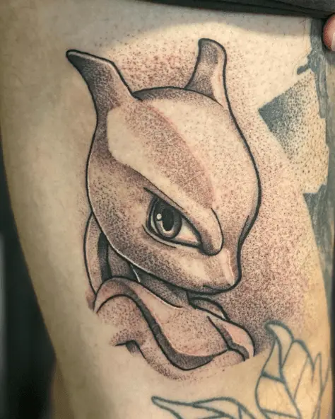 Nerdy Looking Mewtwo Sketch Style Tattoo