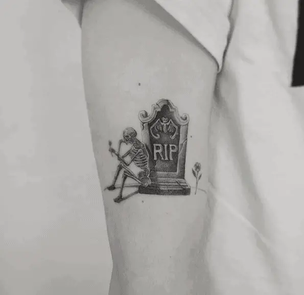 Tombstone and Skeleton Arm Tattoo