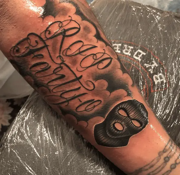 RIP with Sky Mask Tattoo