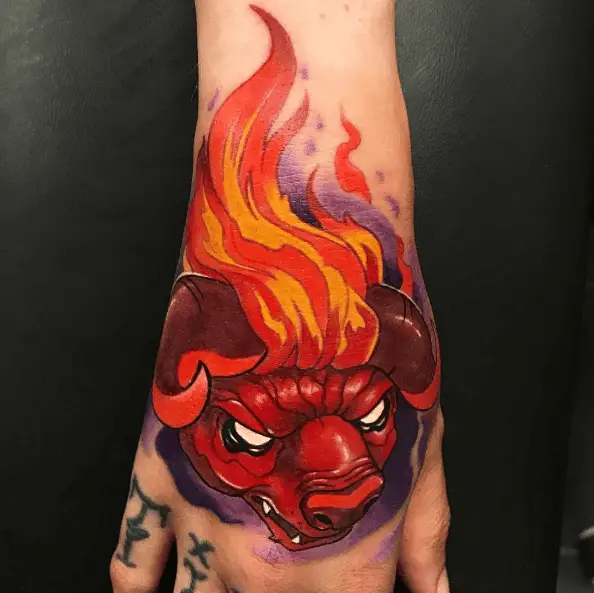 Flaming Red Bull Hand Tattoo
