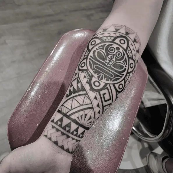 Poly Tribal Forearm Tattoo
