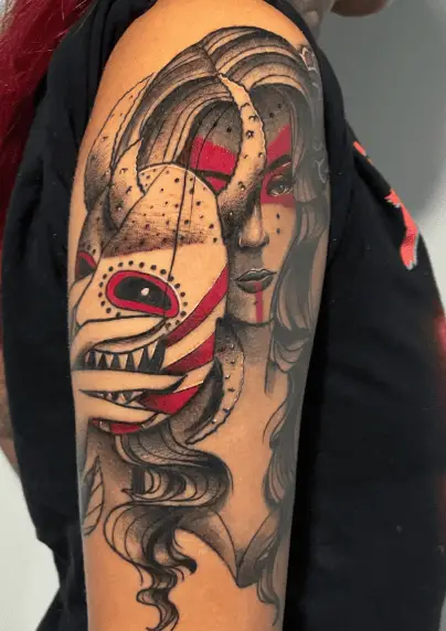 Woman with Mask Arm Tattoo