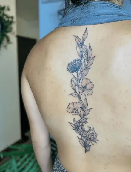 Beautiful Lei with Hawaiians Flowers Back Tattoo