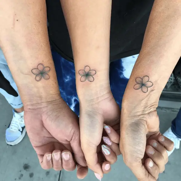Greyish Hibiscus Petal Wrist Tattoo
