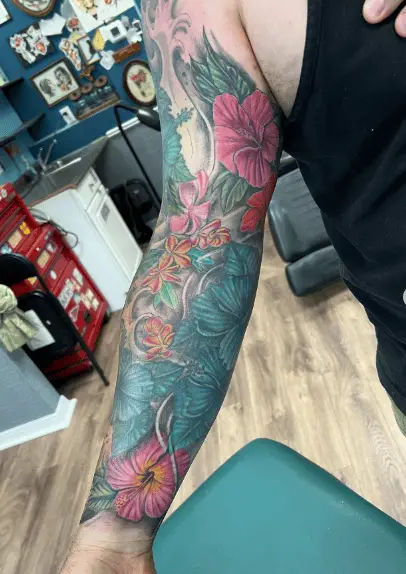 Multicolored Hibiscus Floral Full Sleeve Tattoo