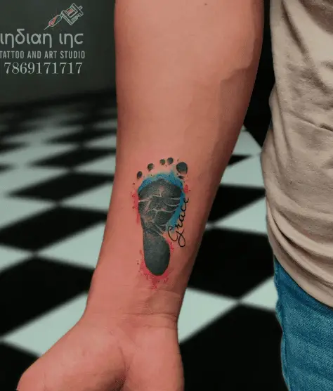 Foot Print Tattoo of Baby with Blue Splash
