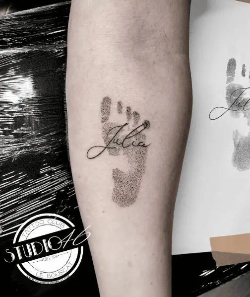 Greyscale Footprint with Name Julia Tattoo