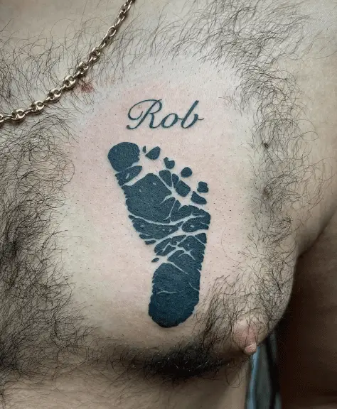 Black Ink Foot Chest Tattoo