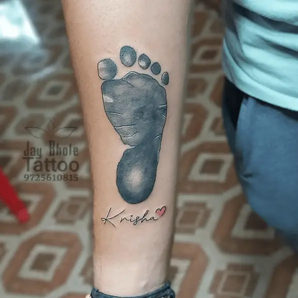 Grey Baby Footprint with Name and Tiny Heart Tattoo