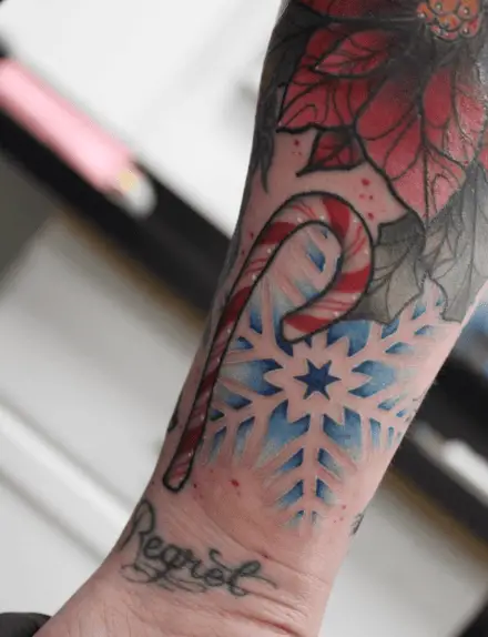 Snowflake and Candy Corn Wrist Tattoo