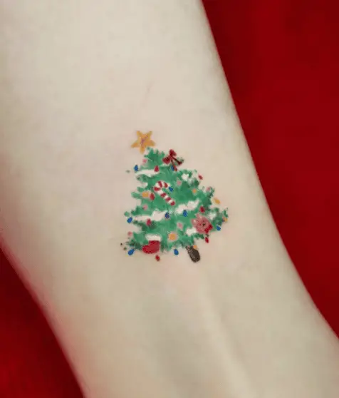 Tiny Christmas Tree Forearm Tattoo