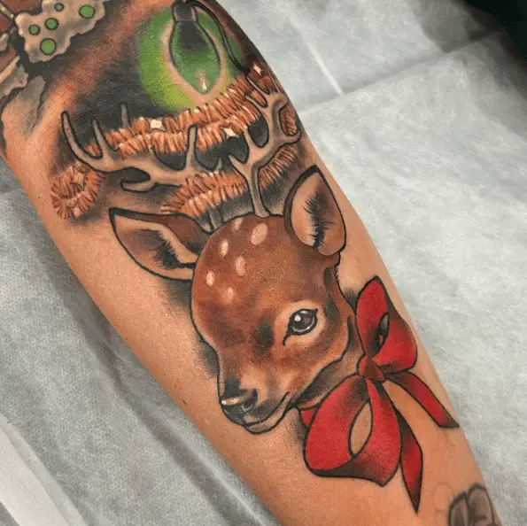 Color Tattoo of a Little Reindeer with Tinsel and Lights Surrounding its Antlers