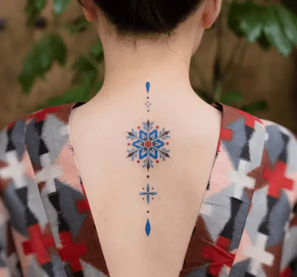 Ornamental Snowflake Back Tattoo
