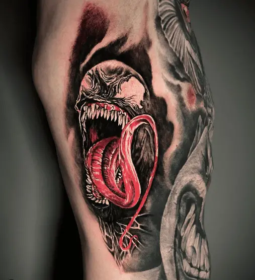 Pink Tongue Venom Rib Tattoo