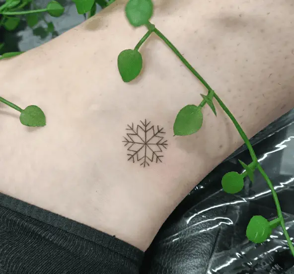 Tiny Little Snowflake Ankle Tattoo