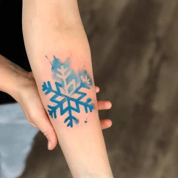 Blue Ink Snowflake Watercolor Tattoo
