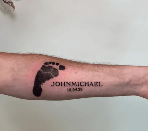 Baby Footprint with Name and Date Forearm Tattoo
