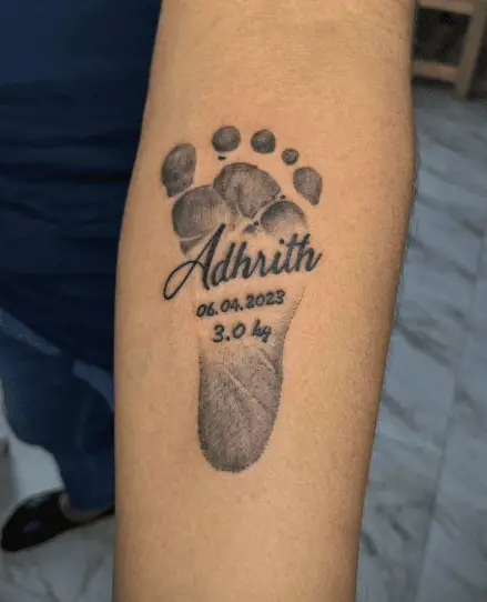 Baby Foot Print with Name DOB and Weight Tattoo