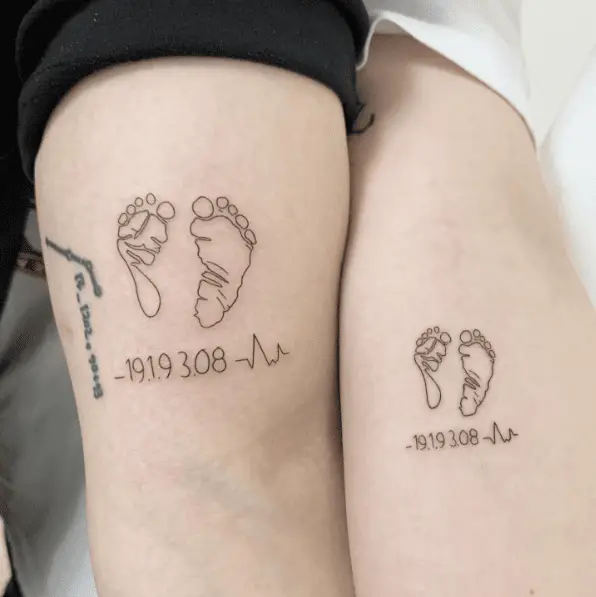 Double Baby Footprints with Heartbeat Rate Line Tattoo