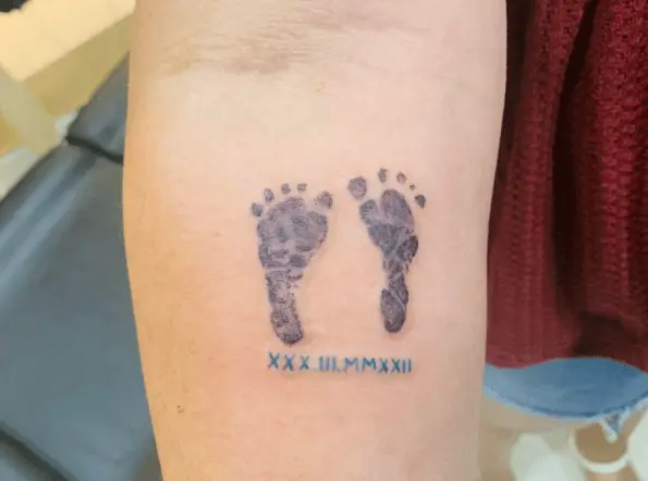Baby Footprints with Roman Numbers Tattoo