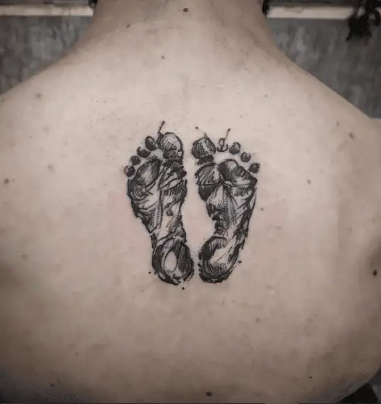 Scribble Style Baby Footprints Back Tattoo