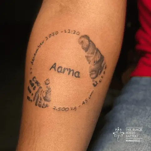 Circle Shaped Baby Prints with Birth Info Tattoo