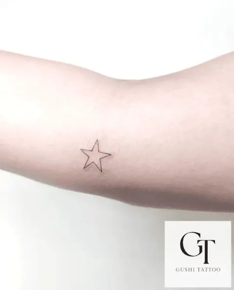 Single Star Fine Line Tattoo