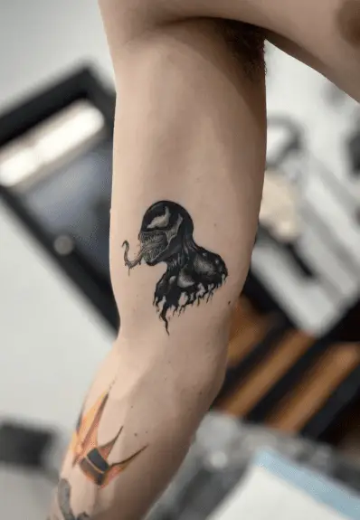 Black Ink Little Venom Tattoo