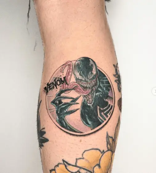 Tiny Piece of Venom Tattoo on a Circle 
