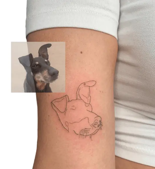 Dog Face Outline Arm Tattoo