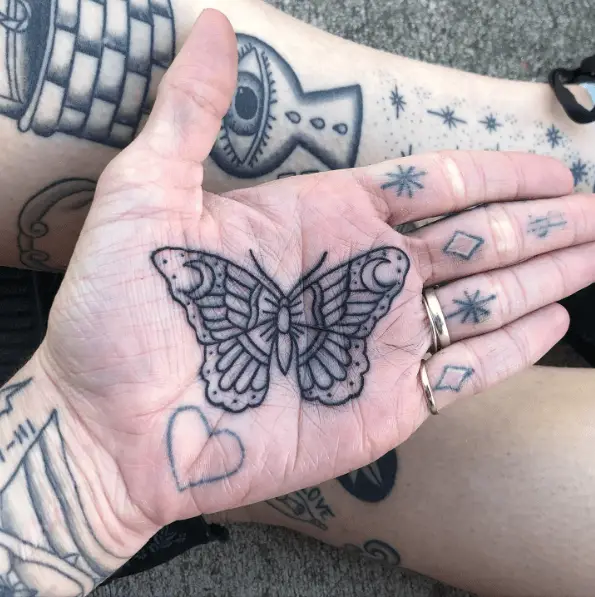 Butterfly Palm Tattoo with Moon Design