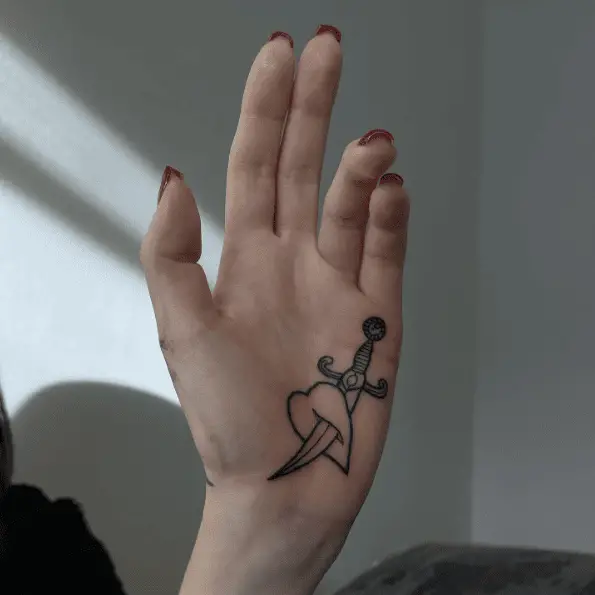 Dagger and Stabbed Heart Palm Tattoo