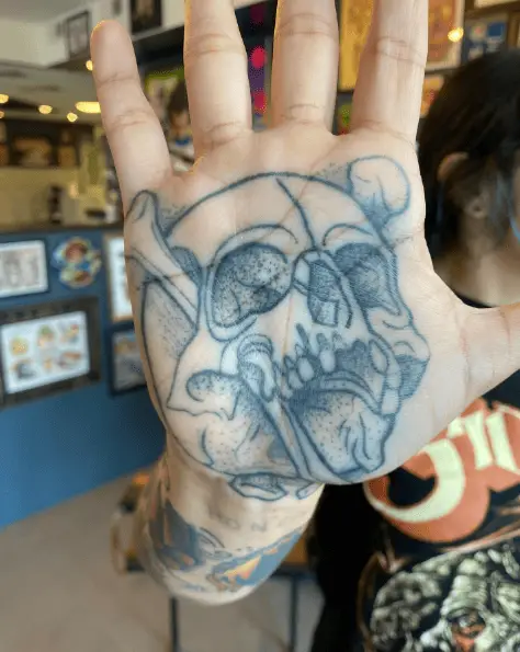 Grey Shade Skull Palm Tattoo