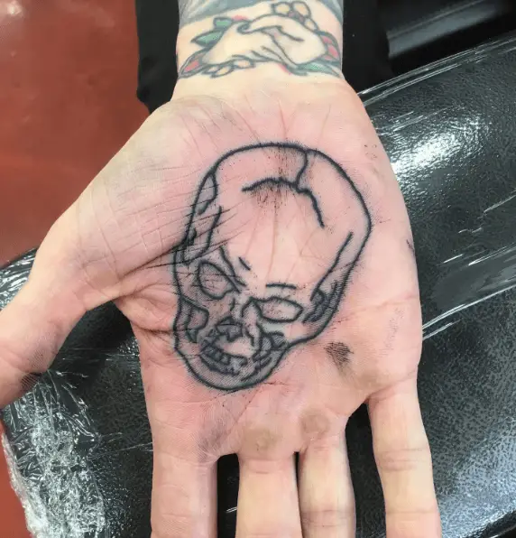 Cracked Skull Palm Tattoo