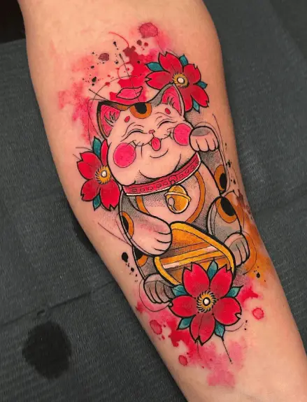 Smiling Maneki Neko Cat with Pink Flowers Tattoo