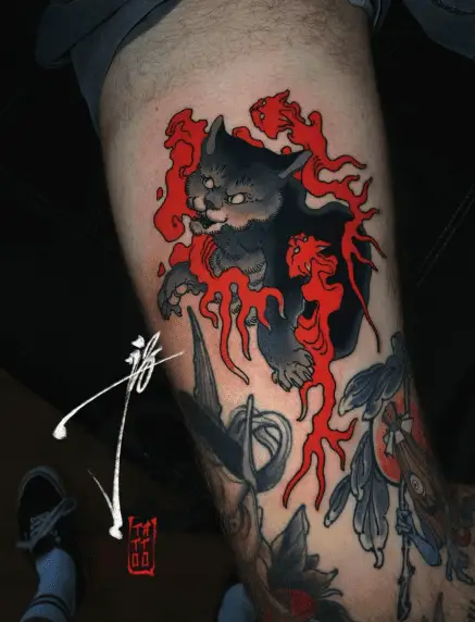 Black and Red Ink Yokai Tattoo