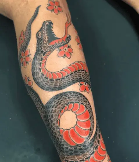 Grey and Orange Ink Japanese Snake Tattoo