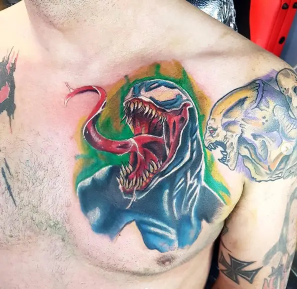 Red Tongue Colored Venom Chest Tattoo