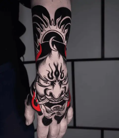 Black and Red Hannaya Mask Hand Tattoo