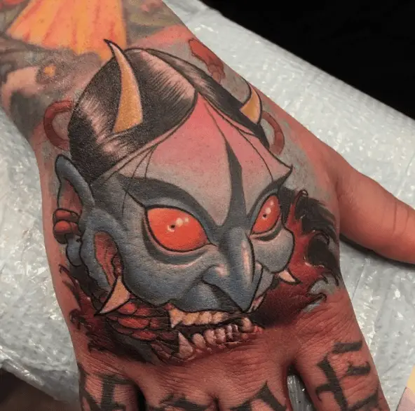 Woman Face Demon Hand Tattoo