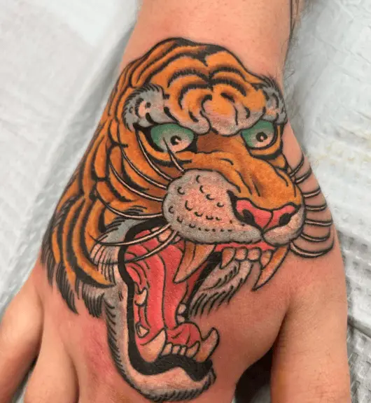 Japanese Tiger Face Hand Tattoo