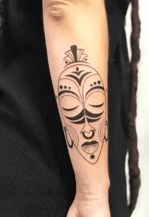 African Tribal Mask Transparent Forearm Tattoo 