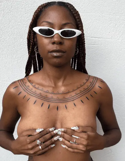 African Tribal Inspired Chest Adornment Tattoo