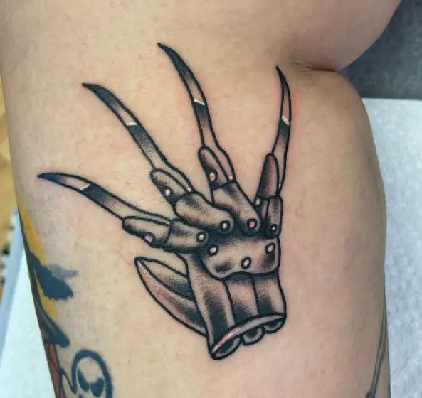 Black and Grey Freddy Claw Tattoo