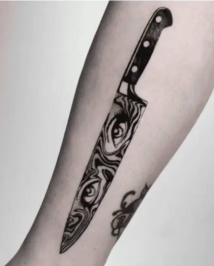 Black Ink Women Eyes With Wavy Lines in Knife Leg Tattoo