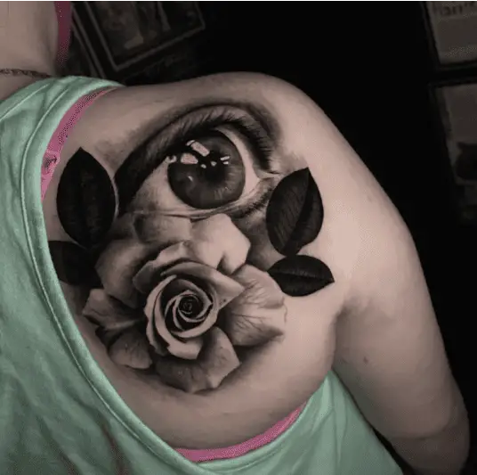 Black and Grey Realistic Eye With Rose Back Tattoo