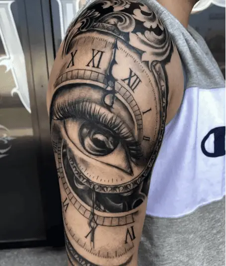 Realistic Wide Eye and Time Upper Arm Tattoo