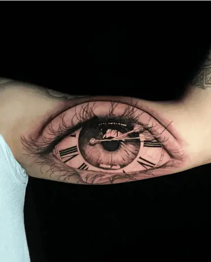 Realistic Eye Clock Upper Arm Tattoo