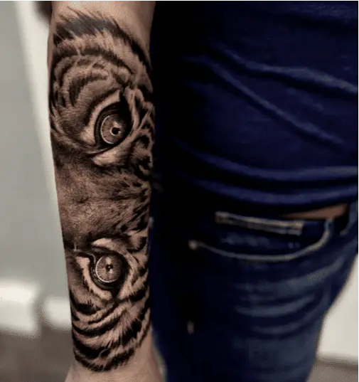 Detailed Tiger Eyes Arm Tattoo