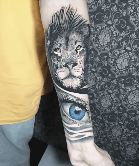 Female Blue Eye and Lion Head Arm Tattoo